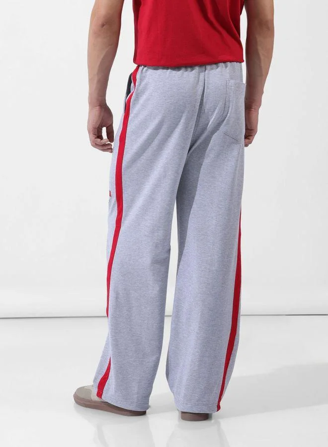 ذا انديان كراج كو Men Loose Fit Superman Printed Side Pocket Mid-Rise Joggers